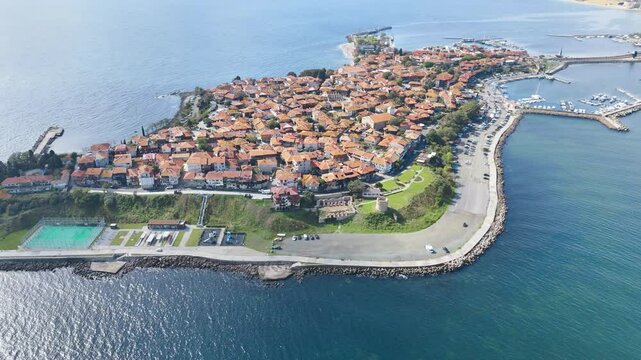 Aerial drone flyby Nessebar, ancient city on the Black Sea island. Travel to Bulgaria