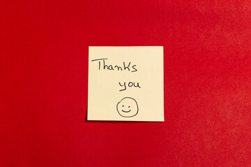 A thank you note is written on a red background