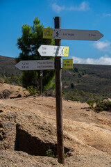 Hiking trail signs with location information on the Canary Island of Tenerife