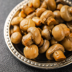 Champignon mushroom canned product tasty food dish fresh delicious gourmet food background on the table rustic food top view copy space top view keto and paleo diet Vegetarian and vegan food