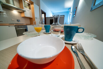Kitchen and TV in a modern bed and breakfast interior