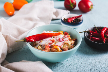Spicy creamy mexican salsa in a bowl on the table