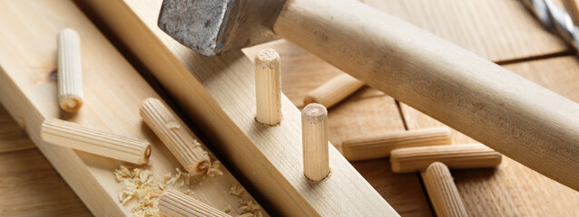 hole in wooden oak board for wooden dowel. carpentry industry.
