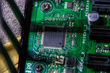 Boards and microcircuits with inscriptions are very close	
