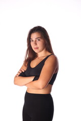 young woman with arms crossed against white background