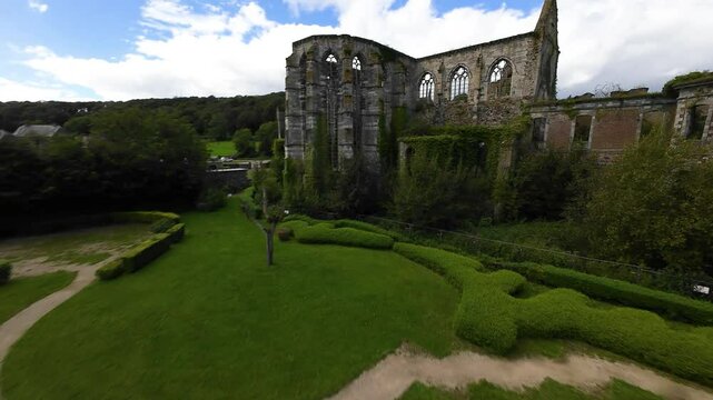 Flying around the ruins of Aulne abbey monastary between thuin and landelies, Belgium. Medieval building and monument.
