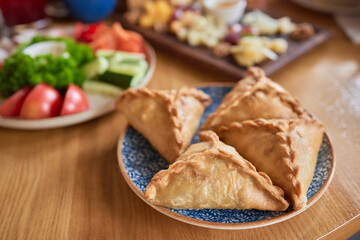 Delicious Golden Samosas Served in a Very Vibrant Setting with Energetic Atmosphere