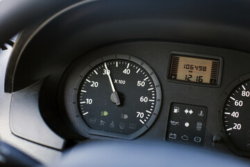 Tachometer in a car showing 3000 RPM. Engine performance indicator on dashboard display. Safe...