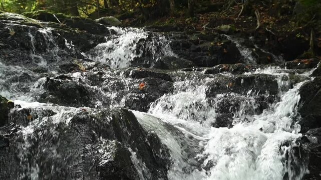 A waterfall from a mountain stream in autumn, slow motion, Josefsthaler Wasserf&auml;lle