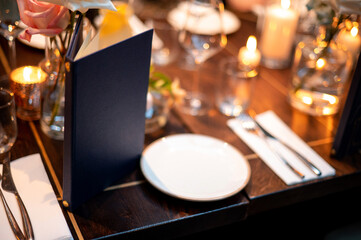 Elegant Dining Table Setting with Candles