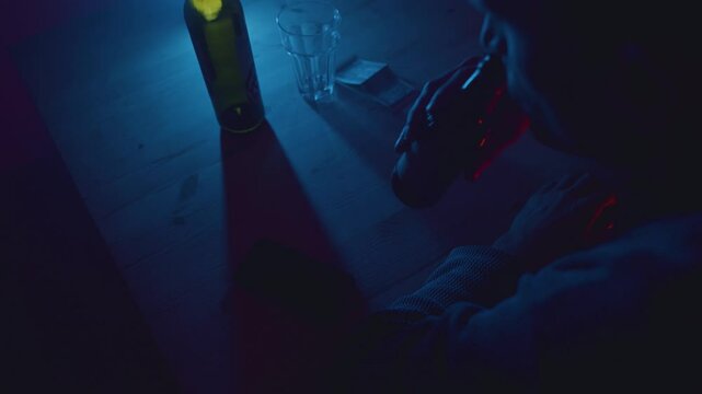 Man drinking a beer alone at the bar