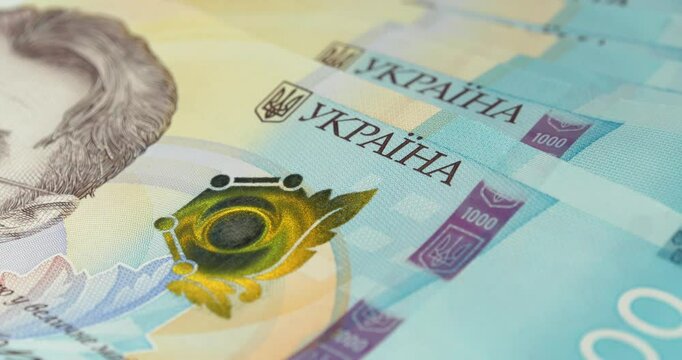 Money of Ukraine. Security signs and elements on banknotes 1000 Hryvnia, UAH. New banknotes 1000 Hryvnia in uncirculated condition, UNC. Ukrainian banknote of max denomination
