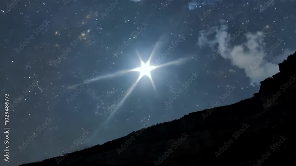 Aufkleber Bright star is shining in the night sky, casting a luminous glow over a dark mountain silhouette. Its brilliant rays illuminate the vast expanse, creating a captivating celestial display