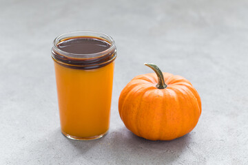 Pumpkin smoothie with coffee in a glass.