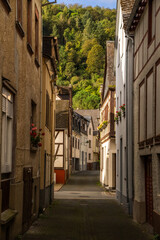 Narrow cobblestone alley with half timber buildings in the old medieval town of Oberwesel, Germany