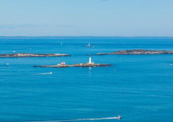Boston Light on Little Brewster Island with Graves Light at the background in Boston Harbor, Boston, Massachusetts MA, USA.