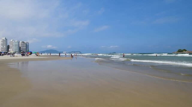 Beautiful morning at Pitangueiras beach. Beach on downtown of Guaruja, SP, Brazil.