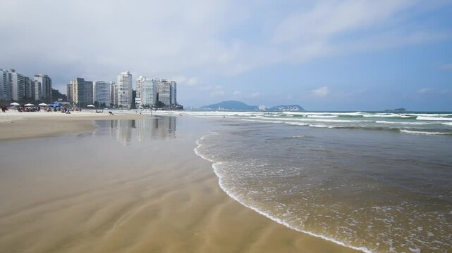 Beautiful morning at Pitangueiras beach. Beach on downtown of Guaruja, SP, Brazil.