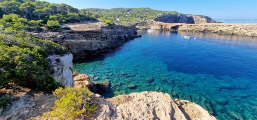 Ibiza coves transparent green water Balearic Islands 