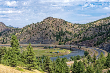 Interstate 15 curves along the Missouri River near Craig, Montana, USA