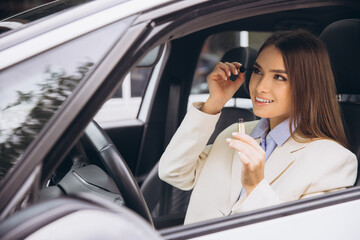Professional Woman Applying Makeup in Car Before Work