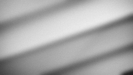 Monochrome abstract gradient featuring soft transitions of gray tones with a grainy texture. Ideal for sleek, minimalistic backgrounds, wallpapers, and professional designs