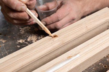 Restoration of a defect on an oak panel