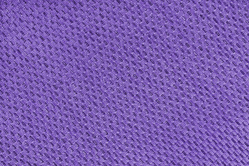 Texture of purple jacquard fabric of diagonal rough weave cloth structure macro background