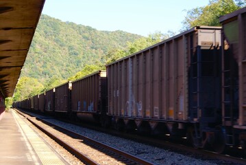 Obraz premium Passing Mountain Coal Train