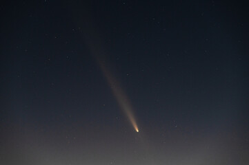 stars and comet in evening sky, magical shot of space after sunset