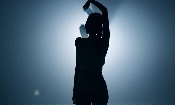 silhouette of a person, model posing in studio	