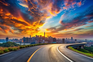 Stunning Drone Capture of Asphalt Road Leading to City Skyline at Sunset with Colorful Sky and Dramatic Clouds