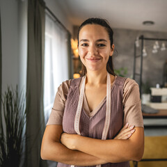 Portrait of adult woman tailor or fashion designer stand and smile