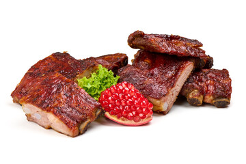 Grilled pork ribs with barbecue sauce, lettuce, and cherry tomatoes, isolated on white background.