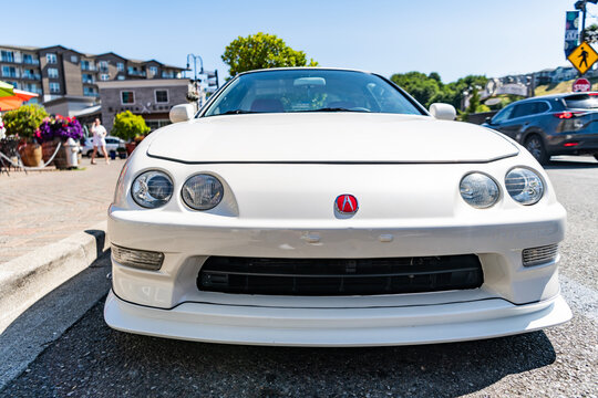 Seattle, USA - July 14, 2024: 1998 Acura Integra Type R sportscar white color parked outdoor, front view. Acura Integra in the street. Luxury car of Acura Integra. Acura Integra dealership