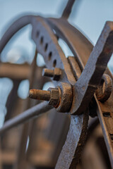 Rusty bolt and nut connecting metal parts