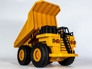 Obraz premium Yellow Mining Truck Model - Realistic Details on White Background