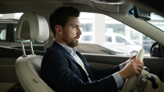 Caucasian adult man businessman driver male touching wheel car auto rental service salon buyer automobile showroom transport dealership testing client inside luxury guy business vehicle purchase owner