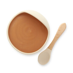 Tasty baby food in bowl and spoon isolated on white, top view