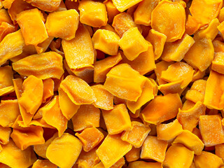 dried mango chips isolated on white background