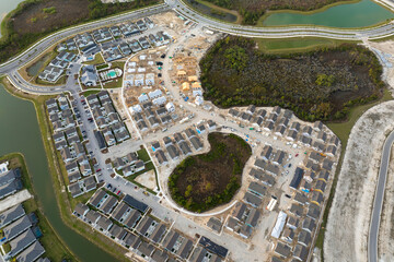 Construction in new developing suburban area. Development of residential housing in American...