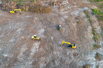 Development of real estate market in the USA. Aerial view of large construction site with building...