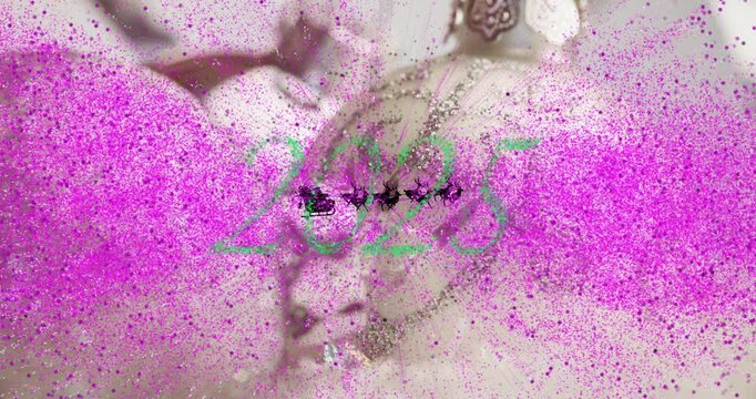 Animation of santa in sleigh over christmas baubles and buon anno text with 2025 year