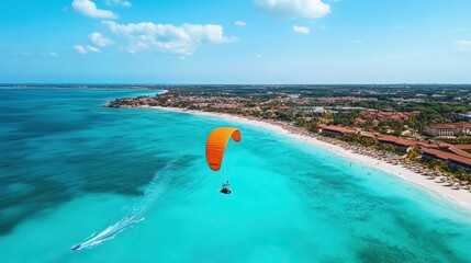Obraz premium Paragliding over a tropical paradise