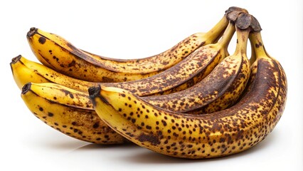 A cluster of overripe bananas with brown spots, showcasing the natural progression of fruit ripening.