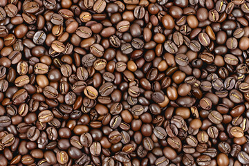 Obraz premium Premium Roasted Rich Coffee Beans Floating Displayed on Rustic Wooden Surface, Ideal for Gourmet Coffee Lovers and Perfect for Artisan Brewing and Fresh Aromas with Copy space