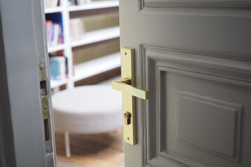 open door concept with Door handle and blur interior room background,