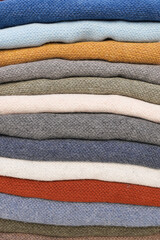 Beautifully Colorful Stacked Textiles Displayed in a Variety of Shades and Textures