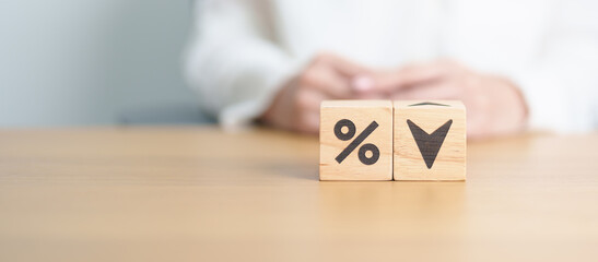wood block of percentage change to UP and Down arrow. Interest rate, GDP, stocks market, financial,...