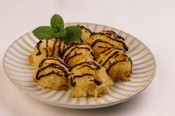 Coconut Macaroon Cookies Garnish With Chocolate.